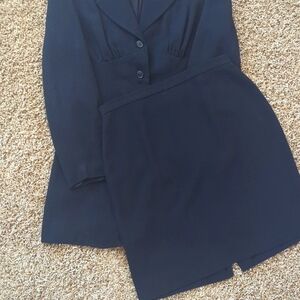 2 Piece black business suit. A-line skirt size 10, unique suit jacket size 8